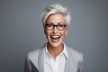 Portrait of a mature businesswoman woman with a laughing face - Powered by Adobe