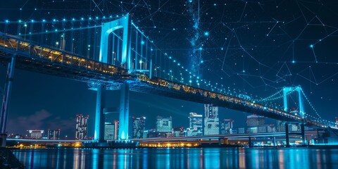 A bridge spans a river in a city at night