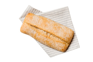 Fresh Homemade Whole Wheat Bread. bread on napkin isolated on white background, fresh bread top view