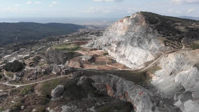 Aerial view quarry open pit sunny day big city background