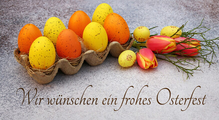 Grußkarte Frohe Ostern:  Ostereier und Blumen mit dem Ostergruß wir wünschen ein frohes...