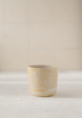 Ceramic tea bowl. Handmade ceramic sauce pan. Minimalism style. Front view. Japanese ceramics. Tea ceremony.