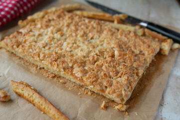 Fresh baked almond cake on baking paper