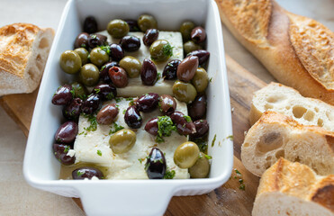 Feta salad with black and green olives. Marinated with olive oil and herbs. 