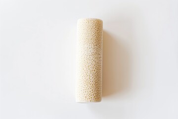 a foam roller placed against a white background - 764586539