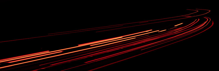 red car lights at night. long exposure