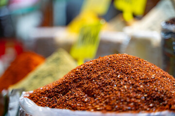 Red chili peppers spice varieties in a traditional Turkish bazaar.