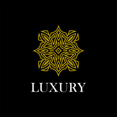 luxury ornamental mandala design background in gold color