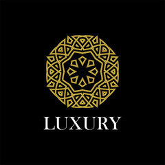 luxury ornamental mandala design background in gold color