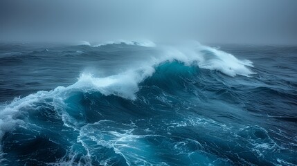 A stormy sea, dark waves under a brooding sky, showcasing nature's power and beauty. 