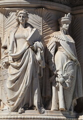 Fototapeta na wymiar Vittoriano War Memorial Sculpted Detail Depicting Standing Women in Rome, Italy