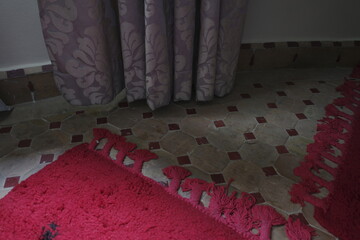 interior of a room with a carpet