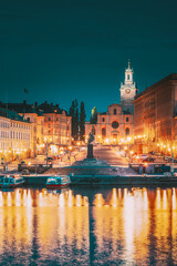 Stockholm, Sweden. Scenic Famous View Of Embankment In Old Town Of Stockholm In Night Lights. Great Church Or Church Of St. Nicholas And Royal Palace. Famous Popular Destination Scenic Place In Lights - 764604907