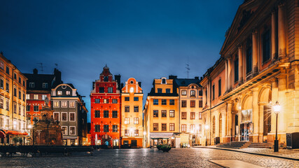 Stockholm, Sweden. Famous Old Colorful Houses, Swedish Academy and Nobel Museum In Old Square Stortorget In Gamla Stan. Famous Landmarks And Popular Place