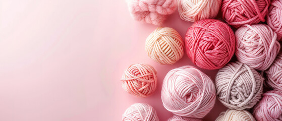 Fototapeta premium crochet yarn and supplies, small side border, pale pink texture top view background, minimalist, empty copy space