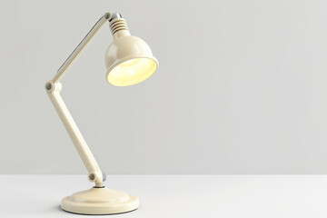 Modern adjustable desk lamp illuminated on a clean white background with ample copy space, ideal for contemporary office or educational concepts