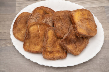 Sugared Torrijas on Serving Plate