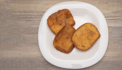 Classic Sugared Torrijas on White Plate
