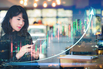 Double exposure of stock market graph and business woman working on smart phone at cafe financial stock exchange marketing concept.	
