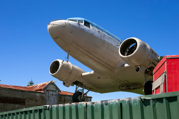 vintage airplane parked in a village, shannon, new zealand, aviation