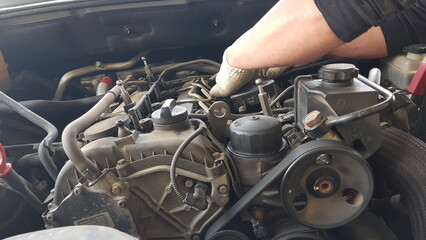 Fototapeta na wymiar Repair of an automobile engine