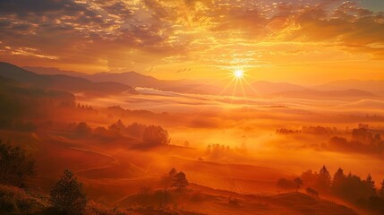 Misty landscape during sunrise in the mountains
