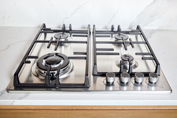 Modern hob gas or gas stove made of stainless steel using natural gas or propane for cooking...