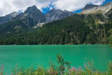 View of Lake antholz, a beautiful lake with emerald water in South Tyrol, Italy - 764648712