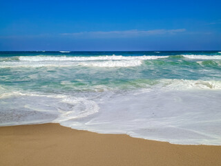 Ocean waves crashing on the sand of Praia Azul, Silveira - Torres Vedras PORTUGAL
