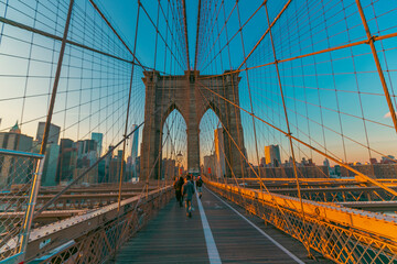 Brooklyn Bridge overlooking Manhattan. beautiful sunset over manhattan with manhattan and brooklyn...