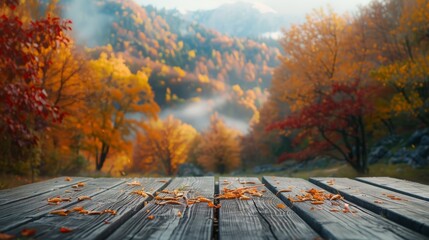 Naklejka na ściany i meble Wooden table and blurred autumn forest and mountain background