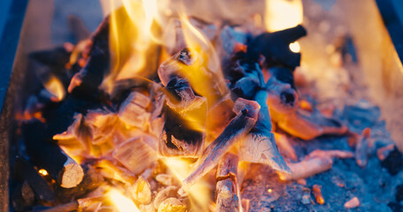 Coal fire in portable barbecue - 764671174