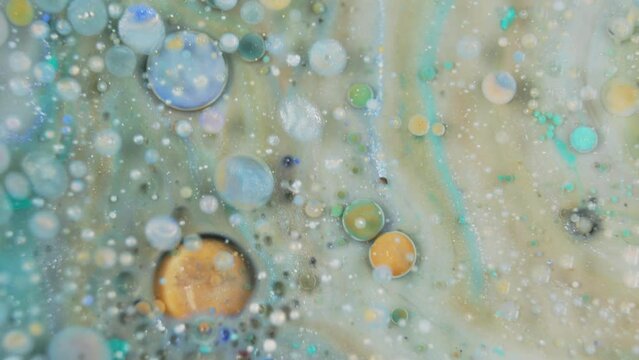 Abstract mix of colorful ink swirling in water, creating a dreamlike liquid art scene, macro shot