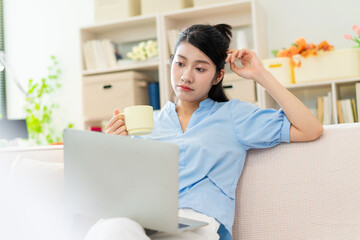 Photo of young Asian girl at home