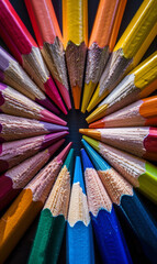 Naklejka premium Colored pencils in circle. A multicolored pencils arranged