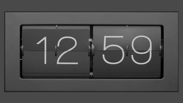 Flip clock quickly flips. .Retro flip clock changing from 12:59 to 13:00. Slow motion. Close up.