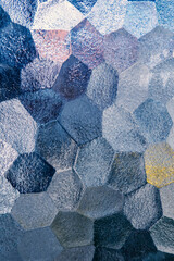 Ribbed glass surface, transparent glowing mosaic glass hexagons background