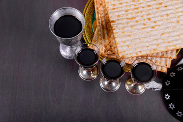 Passover wine cup features Pesach holiday symbols of matzah, an unleavened bread from Jewish...