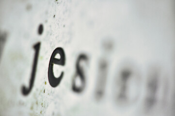 a close-up of text, specifically the letters,