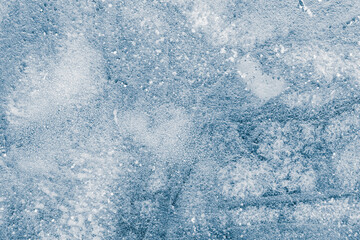 Ice texture background. The textured blue cracked rough cold frosty surface of the ice background. - 764720161
