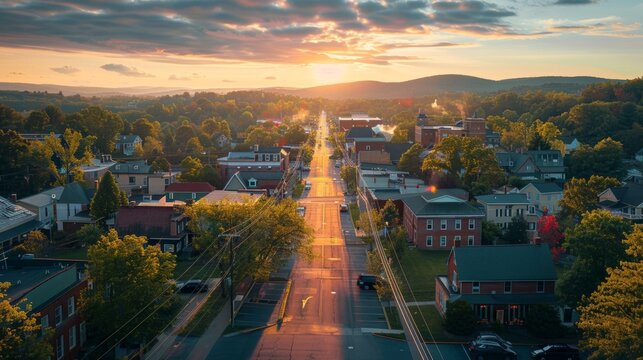 Capture morning light on small town with central landmark in pastel tones