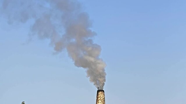 Heavy smoke coming out of smoke stack