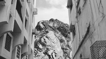 Black And White Urban Canyon With Mountain Peak