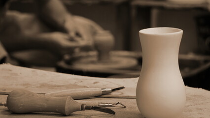 Pottery Workshop Artisan Tools Ceramic Vase Sepia Toned Vertical Composition