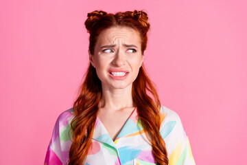 Photo of horrified girl with red tails dressed colorful blouse staring at scary object in empty...