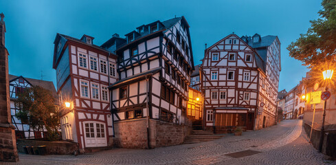 Night medieval street with traditional half-timbered houses, Marburg an der Lahn, Hesse, Germany