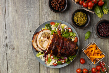 Stuffed turkey breast. Roasted whole, served with fresh vegetables.