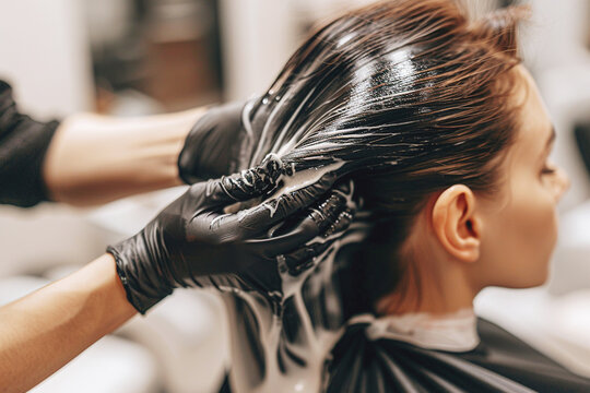 Beautiful woman getting a hair wash in beauty salon