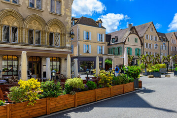 Old street with old houses and tables of cafe in a small town Chartres, France - 764801181