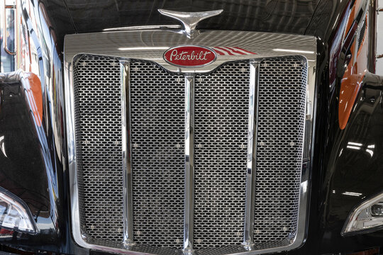Peterbilt Semi Tractor Trailer Trucks logo and truck grille. Peterbilt is owned by PACCAR Trucks.